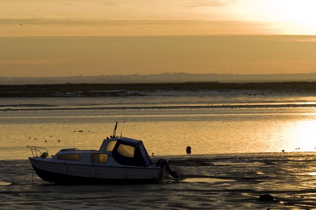Sunrise lit Boat