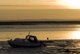 Sunrise lit Boat